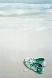 Gymschoenen op het strand